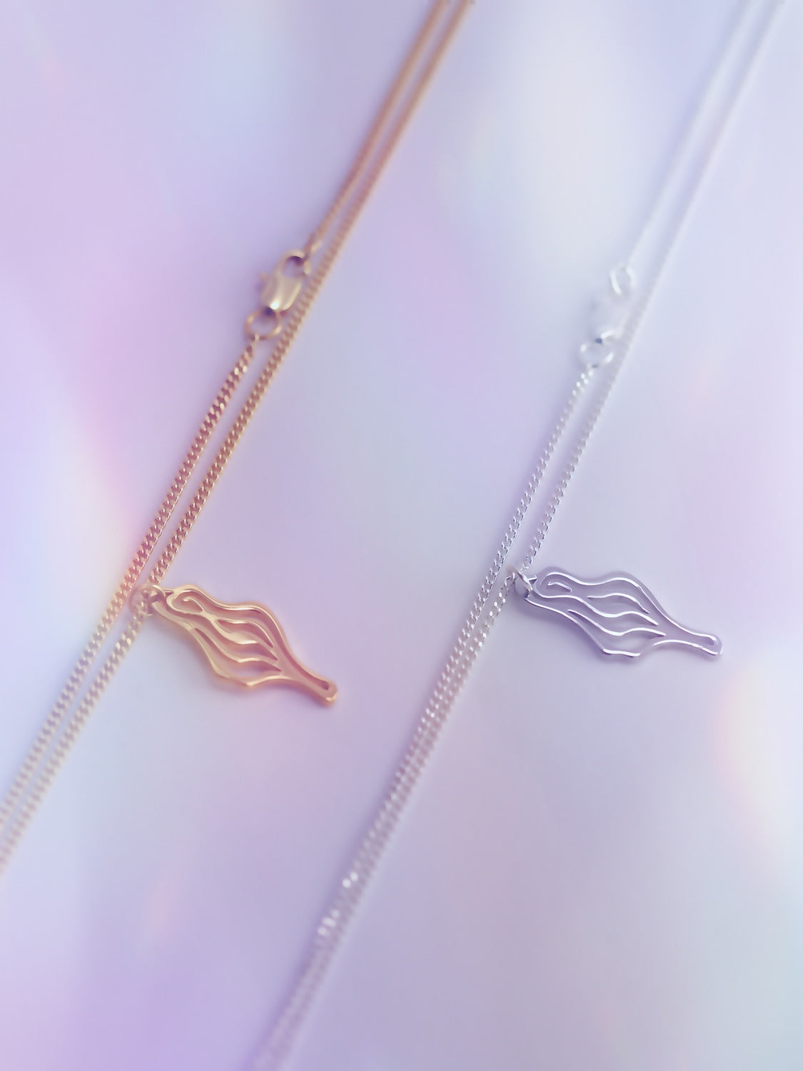 The miraculous medallion now in MINI! Celebrating strength & femininity in gold or silver plating. 2.5cm pendant on a 40cm chain. Made in Italy.