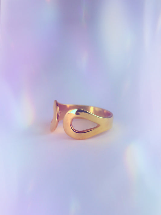 Whimsical yet elegant ringlet, worn on the upper finger. Inspired by tears of joy & letting go. Adjustable open cuff in 925 sterling silver or brass. Made in Germany.