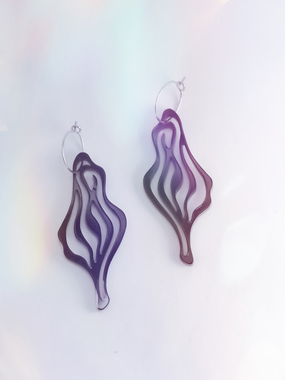 Spirited statement ear dangle celebrating your inner magic! Lightweight acrylic in seasonal colors, with hypoallergenic surgical steel loops. Made in Berlin.