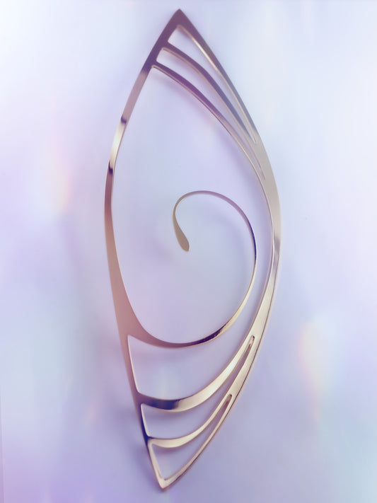 The LACUNA ear piece – a fairy-tale statement without pierced ears. Shiny vulva-inspired design for any occasion. Made in Italy from anallergic brass.