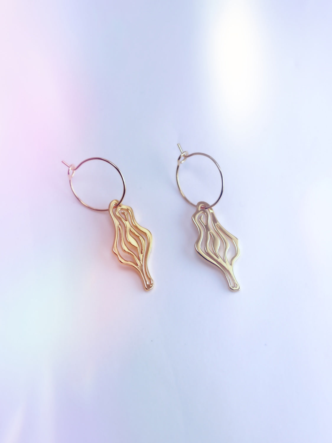 ICONIC ear dangle – a spirited statement of femininity & Berlin nightlife. Wear it solo or mix & match. Made in Italy from galvanized brass & surgical steel loops.