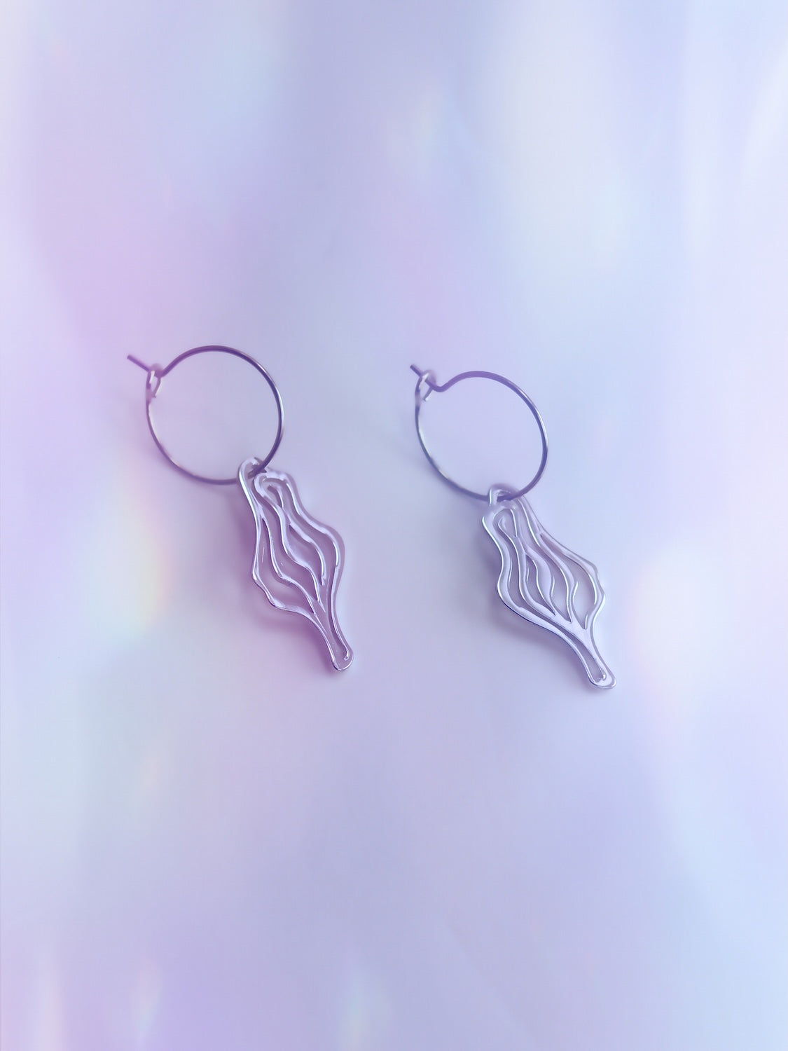 ICONIC ear dangle – a spirited statement of femininity & Berlin nightlife. Wear it solo or mix & match. Made in Italy from galvanized brass & surgical steel loops.